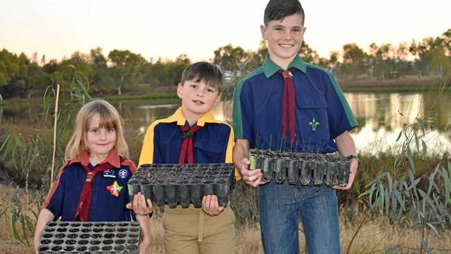 FUTURE PROOFING: Tayla Lee, Renton Silvester and Cooper Regan from Roma Scouts are growing trees for the future of the Roma Bush Gardens. Picture: Ellen Ransley