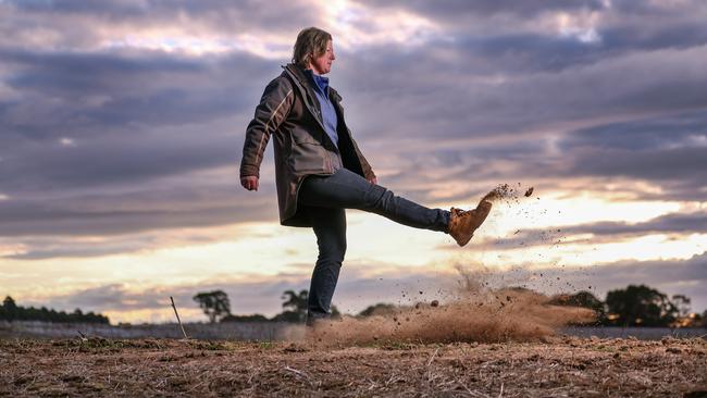 Kathryn Robertson kicks up the dust on her property near Hamilton, Victoria. Picture: Alex Coppel