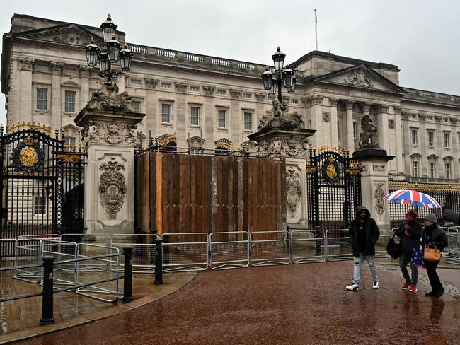 Officers arrested a man who crashed a car into the gates of London's Buckingham Palace over the weekend. The Metropolitan Police said the car "collided with the gates". Picture: AFP