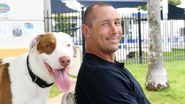 Dean Shelly from Mount Louisa with one of his dogs, Peter. Picture: Shae Beplate.