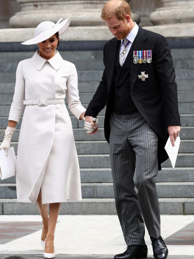 The Sussexes leave the church.