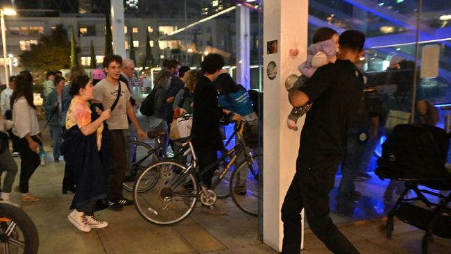 People seek shelter in Tel Aviv as rockets are fired from Gaza. Picture: Getty Images