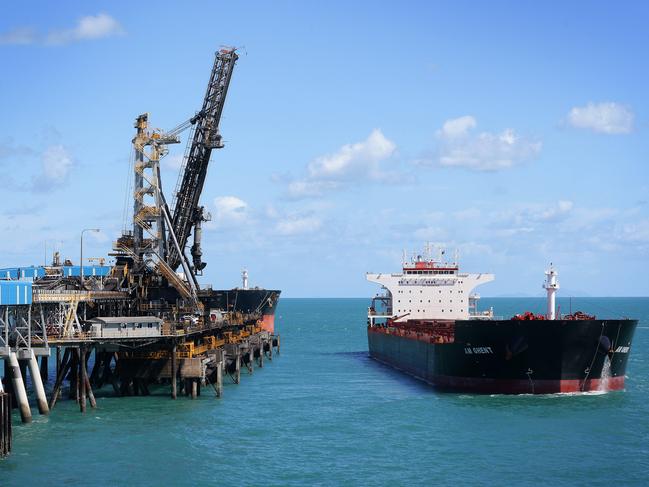 A loaded coal tanker pulls away from the completed $4.1 Billion expansion of BMA Hay Point coal terminal, south of Mackay. Photographer: Liam Kidston.