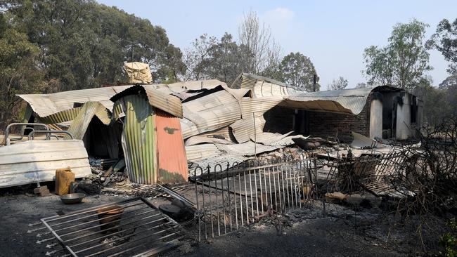 A property destroyed by fire near Colo Heights is just one of more than 530 lost during the bushfires. Picture: AAP