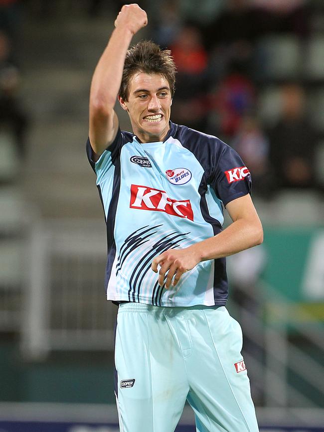 Pat Cummins enjoys a wicket for NSW.