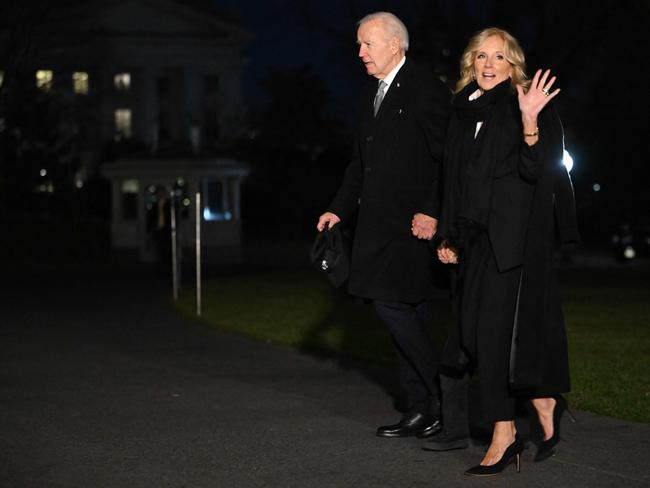 US President Joe Biden with First Lady Jill Biden after stepping off Marine One on their return to the White House in Washington, DC, on December 19. Picture: Andrew Caballero-Reynolds / AFP