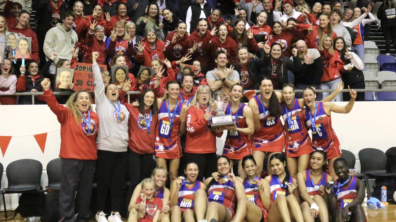 City West Falcons get together with their 'extra player' - their fans - as a long night of celebrations beckons. Picture: Meg Saultry