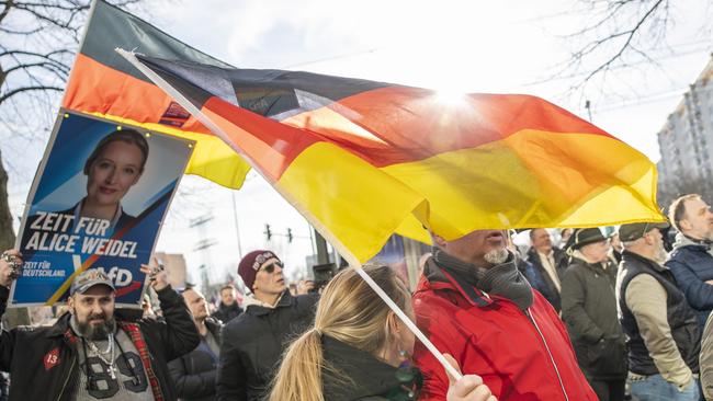 People gather in Berlin’s Hohenschoenhausen district for a rally of the local chapter of the far-right Alternative for Germany (AfD) the day before national elections. Picture: Getty Images