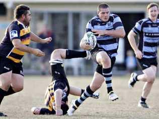 Maroochydore’s James Turvey runs the ball over the Caloundra defence. Picture: Cade Mooney