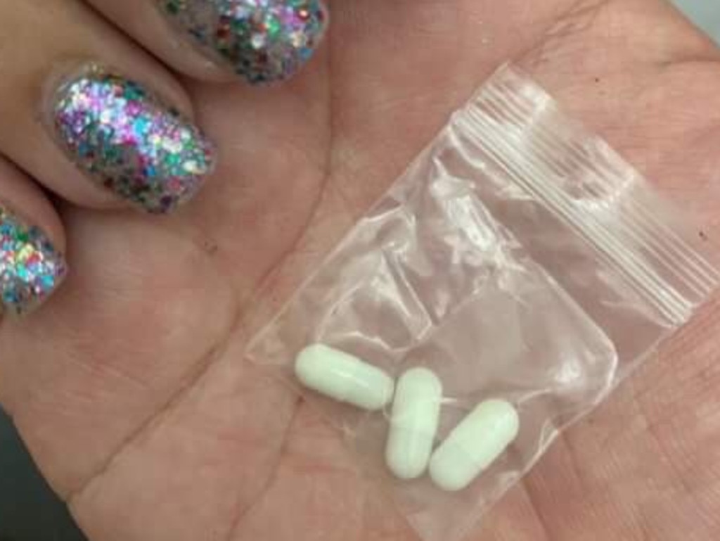 Field Day festival-goer shows what appear to be drugs smuggled into the event. Picture: Derrick Krusche