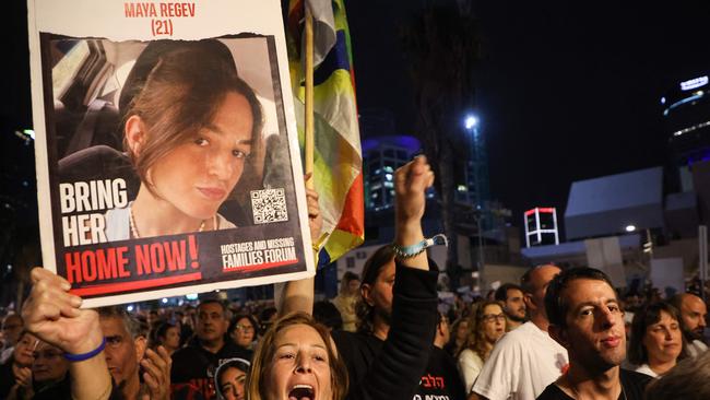 Relatives of 21-year-old Maya Regev. Picture: AFP