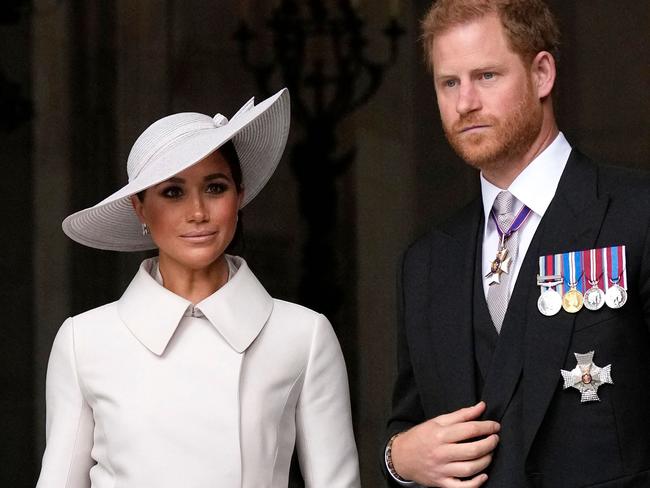 (FILES) Britain's Prince Harry, Duke of Sussex, and Britain's Meghan, Duchess of Sussex, leave at the end of the National Service of Thanksgiving for The Queen's reign at Saint Paul's Cathedral in London on June 3, 2022 as part of Queen Elizabeth II's platinum jubilee celebrations. Prince Harry and wife Meghan Markle were involved in a 