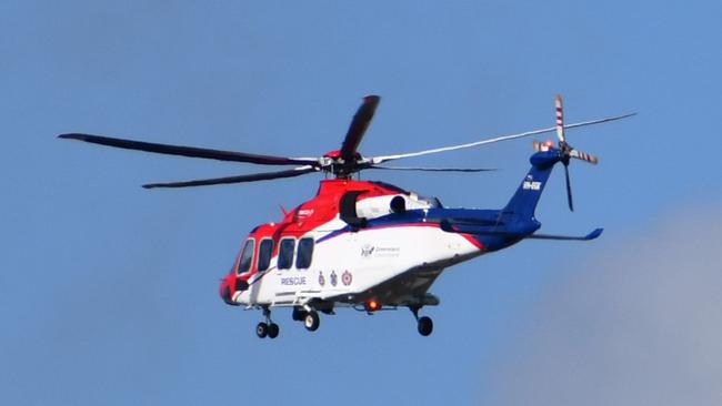 The Queensland Government Air (GQAir) rescue helicopter transports a critically injured man from Ingham Hospital to Townsville. Picture: Cameron Bates