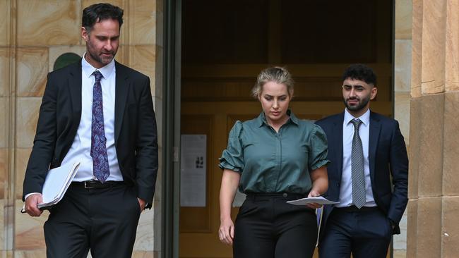 Megan Skye Blancada, centre, leaves Adelaide Magistrates Court after pleading guilty to child sex charges.