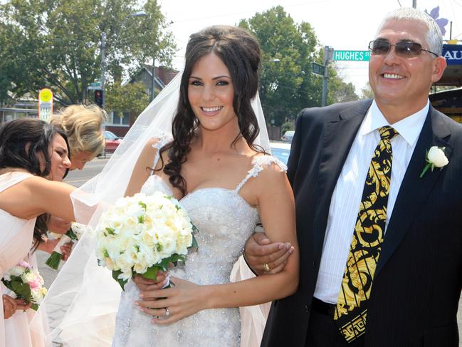 Sarah Gatto and her father Mick Gatto in 2009.