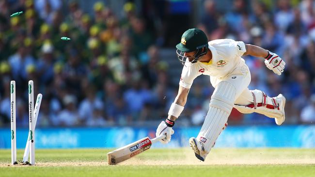 Matthew Wade scrambles to make his ground. Picture: Getty Images