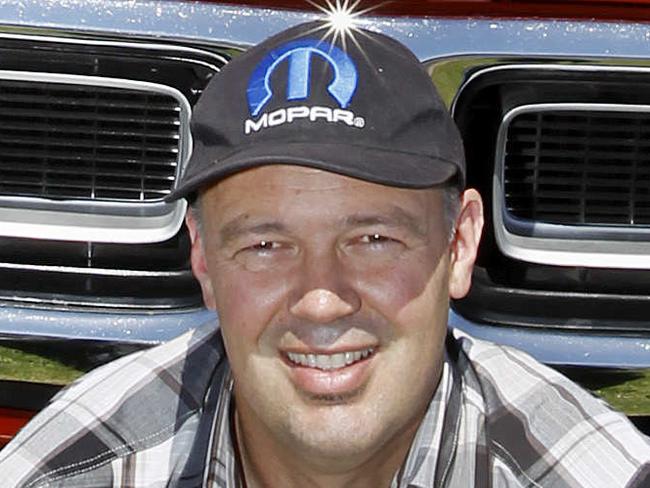 Dandenong open air cinema, Lunar Drive-In is hosting its 10th classic car show on February 1, with classic vehicles on display and Back to the Future playing. Owner David Kilderry with a red classic car.