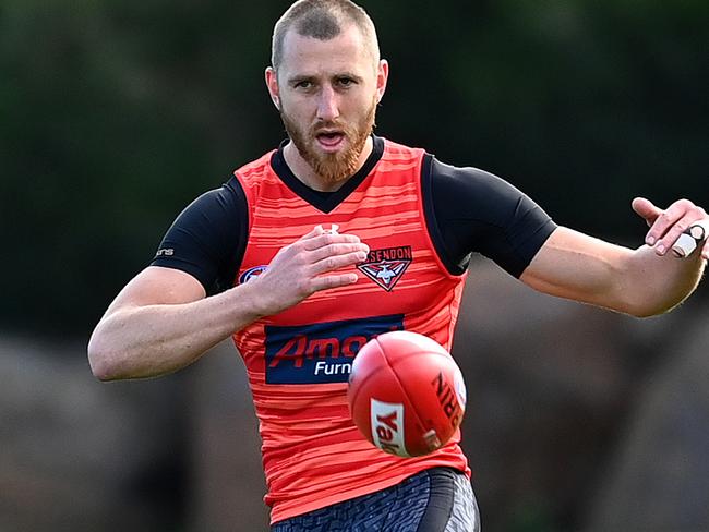 MELBOURNE, AUSTRALIA - JUNE 02: Dyson Heppell of the Bombers kicks during an Essendon Bombers AFL training session at The Hangar on June 02, 2020 in Melbourne, Australia. (Photo by Quinn Rooney/Getty Images)