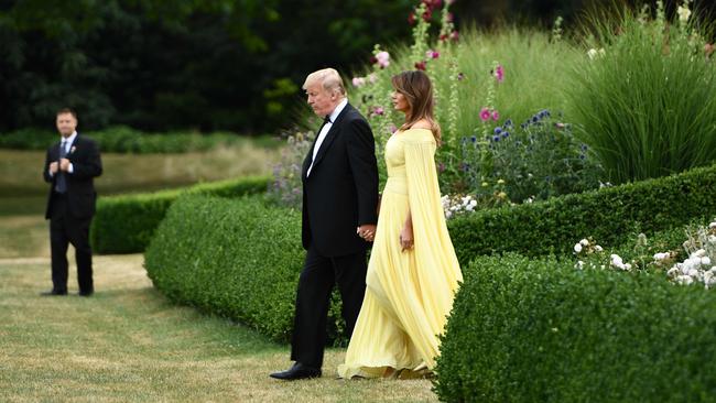 Donald and Melania Trump leave the US ambassador's residence in London for dinner at Blenheim Palace. Picture: AFP.