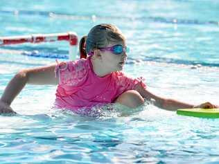 Lucy Sturgeon enjoys swimming lessons. Picture: Tony Martin