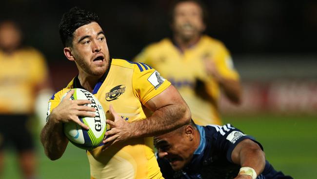 Nehe Milner-Skudder of the Hurricanes looks to pass.