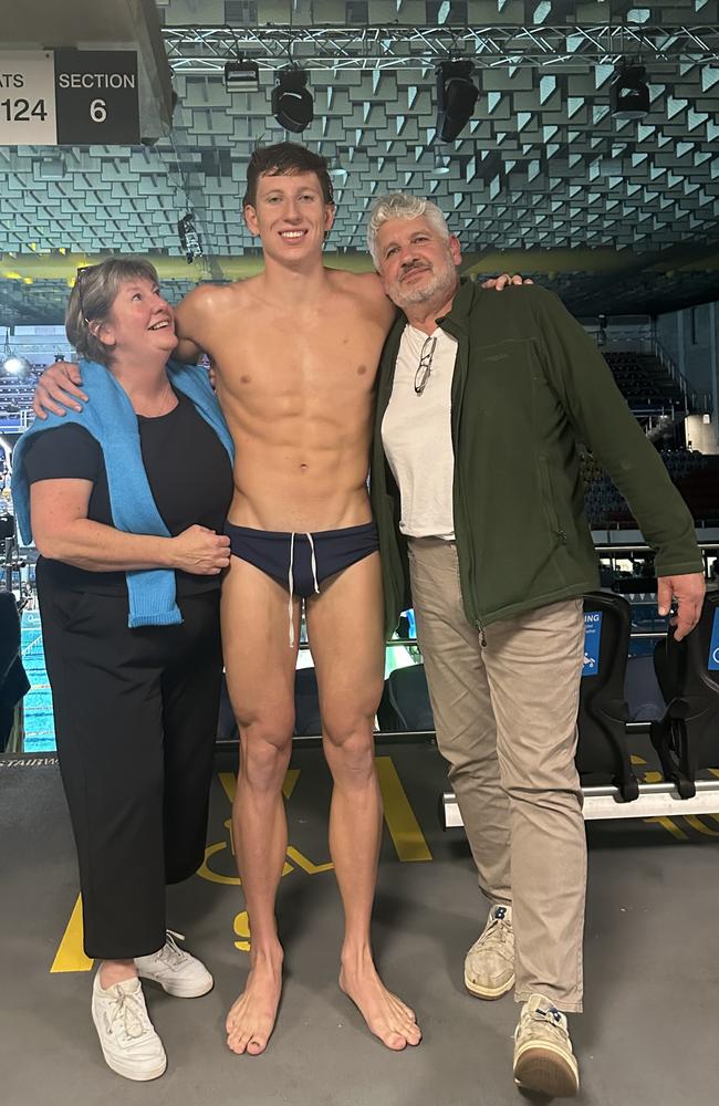 Tasmanian swimmer Max Giuliani with mum Jo Spargo and dad Mic Giuliani after Max won the men's 200m freestyle and a spot on the team for the Paris Olympics
