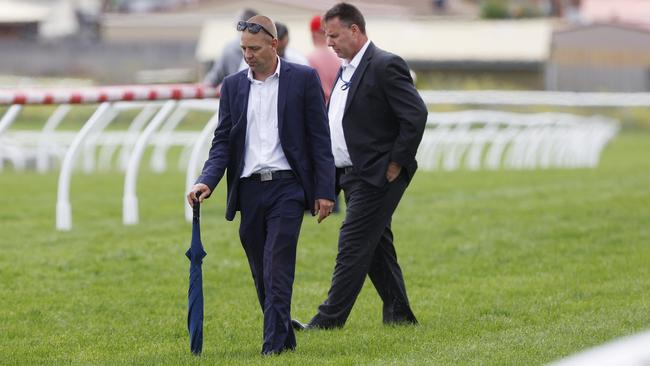 Chairman of stewards Scott Quill and acting director of racing Tony Latham inspect the surface at Elwick.