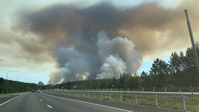 Smoke from the vegetation fire can be seen when driving along the Bruce Highway. Credit: Judith Dean