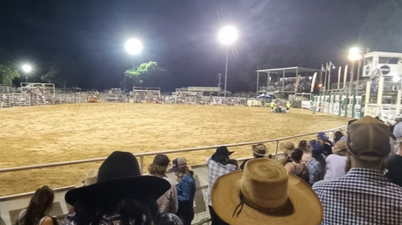 The crowd looks on as the cowboy is assessed. Picture: Brett Wilson