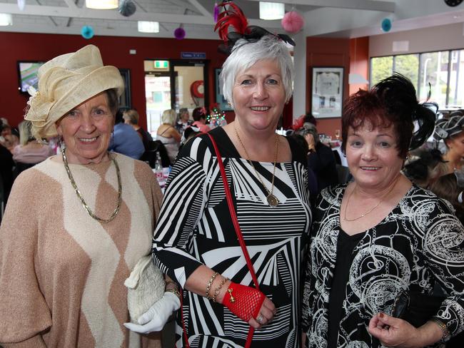 Betty Hite, of Wynyard, left, Jenni Clark, of Burnie, and Sue Bramich, of Burnie, at the Burnie Tennis Club for the Melbourne Cup.