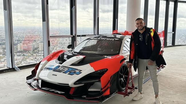 Adrian Portelli with his $3m McLaren after it was craned into his Melbourne penthouse. Image supplied.