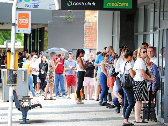 People lining up for hours to register at Centrelink Nundah, Queensland. Picture: AAP