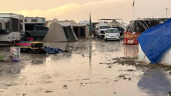 Revellers attending the 2023 Burning Man Festival in Nevada were told to conserve food and water with heavy rain causing flooding to the remote site. Picture: Facebook.