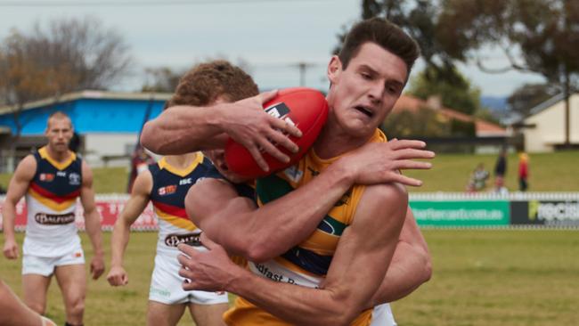 Luke Thompson has been a pillar in defence for Woodville-West Torrens since his delisting from the Crows. Picture: AAP Image/MATT LOXTON