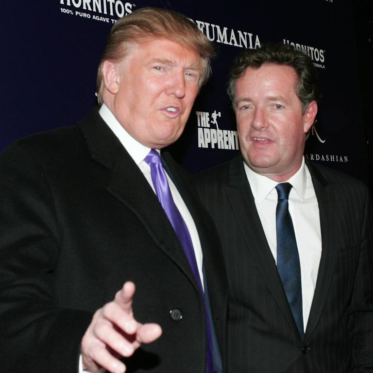 (Donald Trump and Piers Morgan celebrate Kim Kardashian’s appearance on The Apprentice in 2010. Picture: John W. Ferguson / Getty