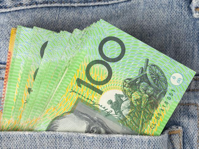 Australian 100 dollar notes in jeans pocket. money, wealthy, rich generic