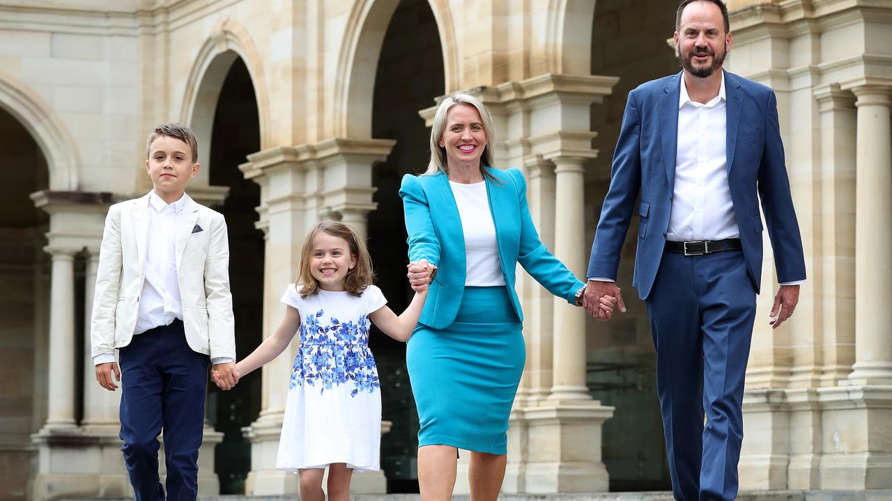 Kate Jones outside Parliament House with her family, husband Paul Cronin, son Thomas, and daughter Grace, after announcing she was quitting State Parliament. Picture: Liam Kidston