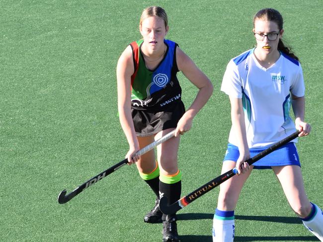 Metro South West and Wagga Wagga players in the semi finals of division 3, NSW U18s Girls Hockey Championships, May23.