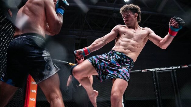 Jack Jenkins tries to kick his opponent during a fight. Picture: Eternal MMA.