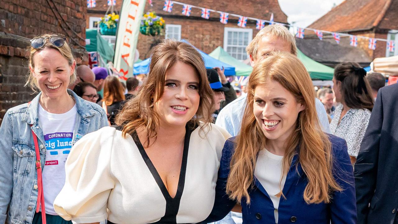 Britain's Princess Beatrice of York (R) and Britain's Princess Eugenie of York (L) attend the Coronation Big Lunch. Picture: AFP