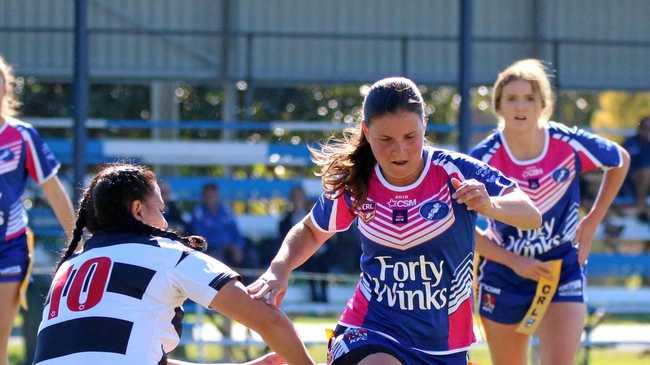 Ghosts league tag captain Elle Moss kicks through for herself during a match last season. Picture: Greg Moss