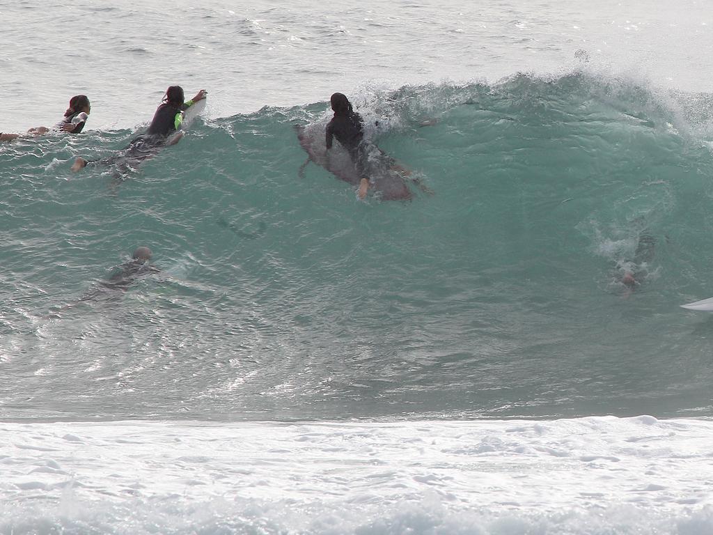 Surfers pictured enjoying good swell and near perfect waves at Snapper Rocks. Picture: Mike Batterham