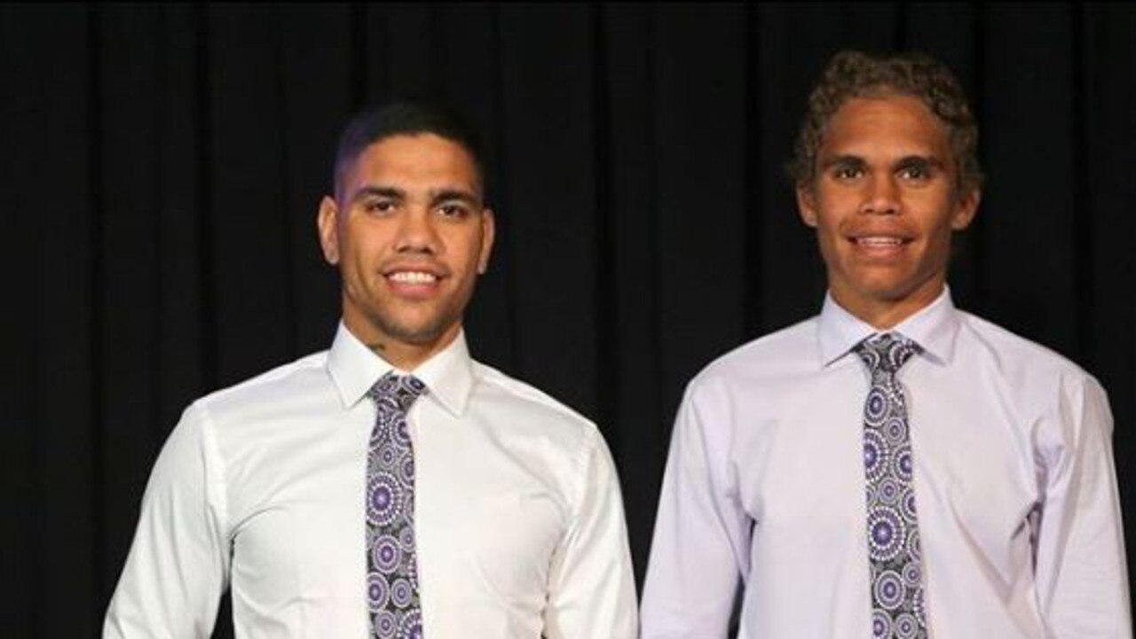 Michael Walters and Liam Henry model the purple tie. Photo: Instagram