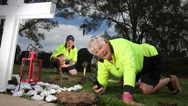 Forest Lawn Memorial leading hands Beth Roberts and Sharon Read with some of the cow poo. Picture: Robert Pozo