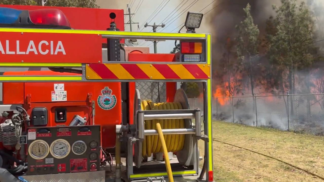 Firefighters are working to contain the running grass fire. Picture: NSW RFS