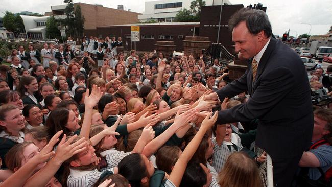 Prime minister Keating mobbed by enthusiastic young fans at a Parramatta school in 1996.