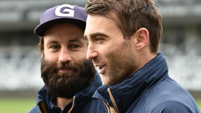 A man, a beard and a Boris. Plenty of love between Jimmy and teammate Corey Enright ahead of their milestone games. Picture: Nigel Hallett