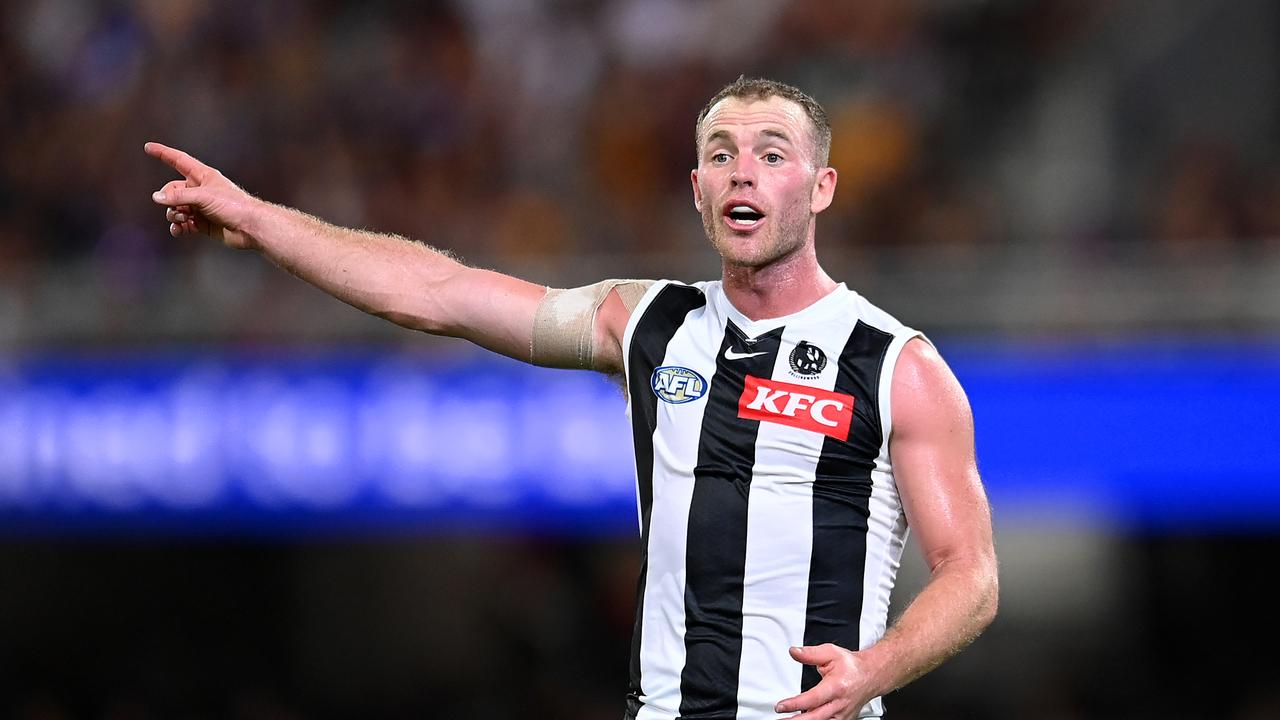 BRISBANE, AUSTRALIA – MARCH 28: Tom Mitchell of the Magpies gestures during the round three AFL match between Brisbane Lions and Collingwood Magpies at The Gabba, on March 28, 2024, in Brisbane, Australia. (Photo by Albert Perez/AFL Photos via Getty Images )