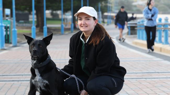 The Daily Telegraph 31.7.2024. Anna Ryder with her dog Luigi at Coogee beach. Talking about interest rate on her mortgage.  Picture: Rohan Kelly