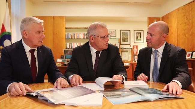 Deputy Prime Minister Michael McCormack, left, Scott Morrison and Treasurer Josh Frydenberg on Monday. Picture: Adam Taylor / PMO